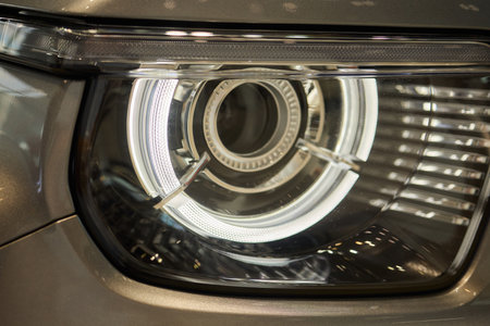 Close up of a cars headlight, part of automotive designの写真素材