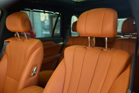Indulge in Luxurious Orange Leather Car Seats that feature a Unique and Stylish Designの写真素材