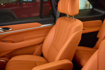 Indulge in Luxurious Orange Leather Car Seats that feature a Unique and Stylish Designの写真素材