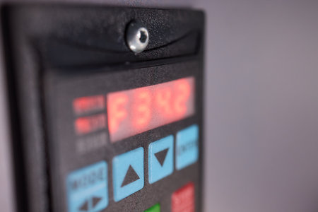 Industrial control panel with circuit breakers and digital interface for electrical systems