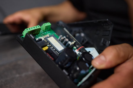 burnt Electronic circuit board with cooling fan and ribbon cable for hardware technology
