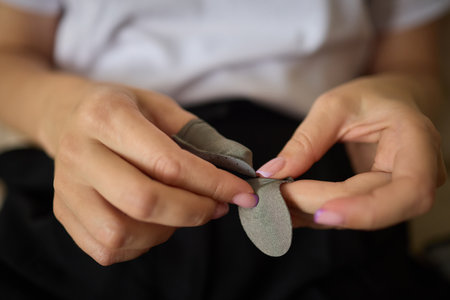 Grip gloves improve comfort and control for a better gaming experience on mobile devicesの写真素材