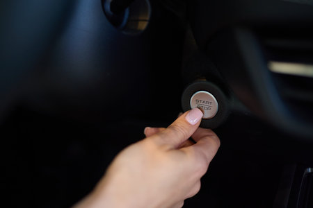 To start a car, the engine is initiated by turning a key in the ignition switch with the hand