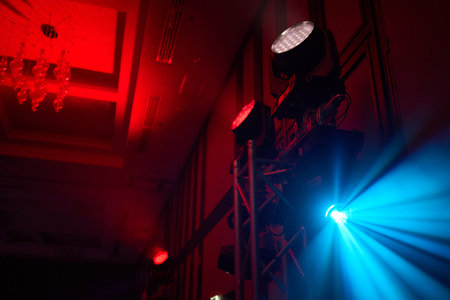 Concert lighting and effects in a night venue create an electrifying atmosphereの写真素材
