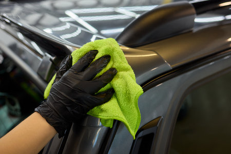 The Professional Car Detailing Process uses ceramics specialized products for exceptional automotive careの写真素材