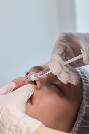 Lip Enhancement Procedure Injectable Treatment in Progress for a more stunning appearance