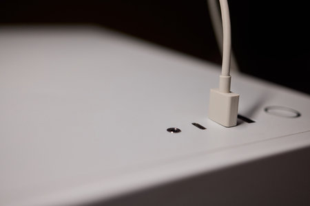 A person is writing on a white surface with a pen, generating creative ideas and concepts
