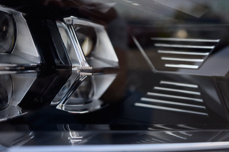 Close up of a cars headlight, part of automotive design