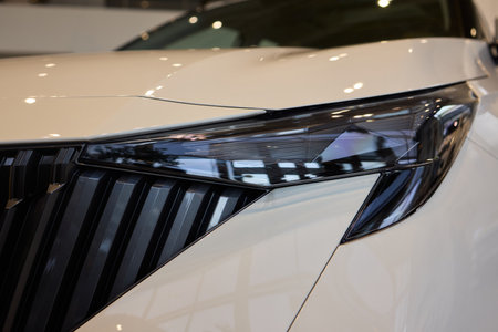 Close up of a cars headlight, part of automotive designの写真素材