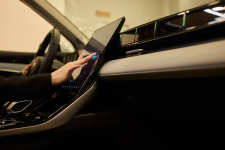 A modern car interior with advanced touchscreen controls enhances user experience and convenienceの写真素材