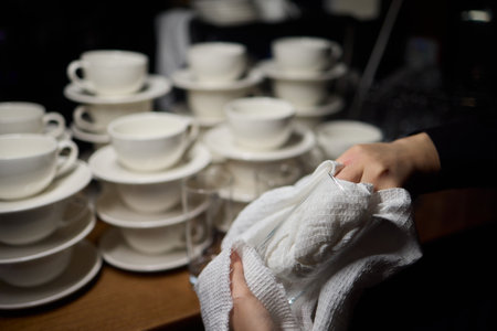 Barista Cleaning Towels Arranged Neatly in a Cozy and Inviting Cafe Setting Atmosphereの写真素材