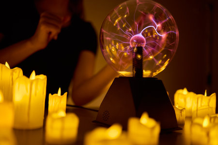 Experience a Mystical Scene with an Energy Ball and Candles, evoking Spiritual Vibesの写真素材