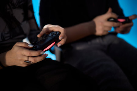 Enjoy an exciting gaming session with a handheld console full of thrills and adventuresの写真素材