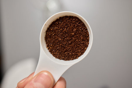 Freshly Ground Coffee is Now Ready and Waiting for You to Enjoy Your Brewing Experience Soonの写真素材