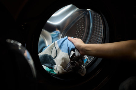 Laundry Day Enjoying the Soft and Fresh Bedding That Comes Straight from the Dryerの写真素材