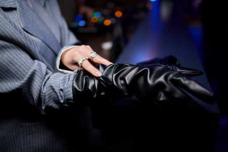Exquisite and Elegant Hands Dressed in Fashionable and Stylish Black Gloves for All Occasions