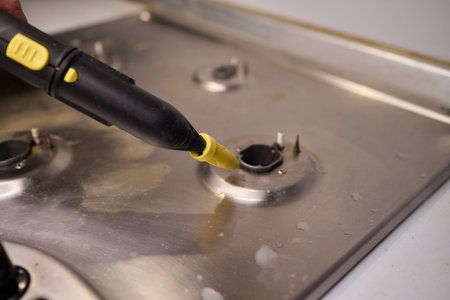 Utilize Efficient Steam Cleaning for Maintaining the Cleanliness of Stovetop Surfacesの写真素材