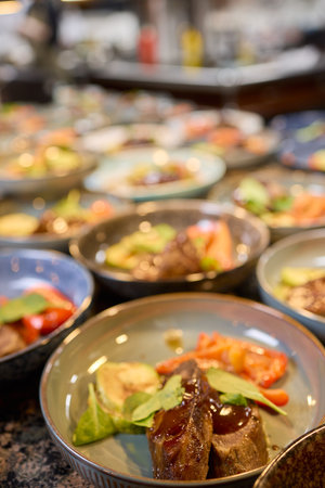 Experience the art of preparing gourmet meals in a high end professional kitchenの写真素材