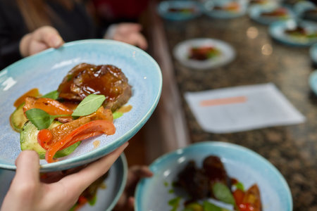 Experience the art of preparing gourmet meals in a high end professional kitchenの写真素材