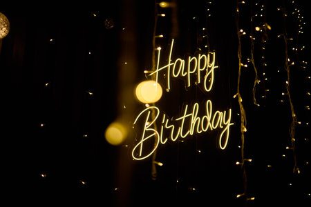 Join us for a joyous and festive Happy Birthday Celebration adorned with Glowing Lightsの写真素材