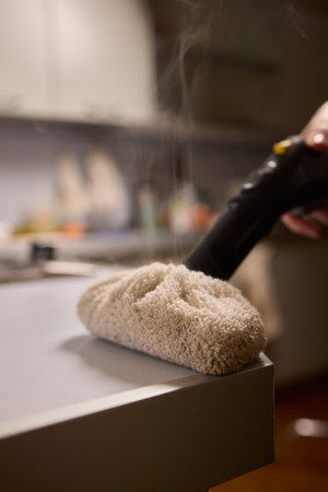 Achieving Efficient and Thorough Cleaning with a Steam Cleaner in a Modern Kitchen Setting