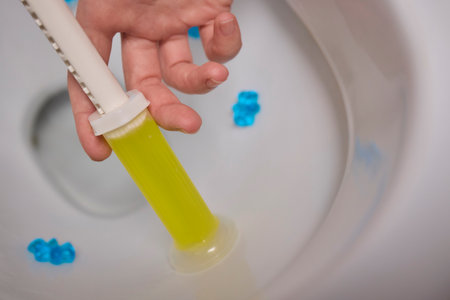 Toilet Cleaning Process with Liquid Cleaner Utilizing a Disposable Applicator for Efficiencyの写真素材