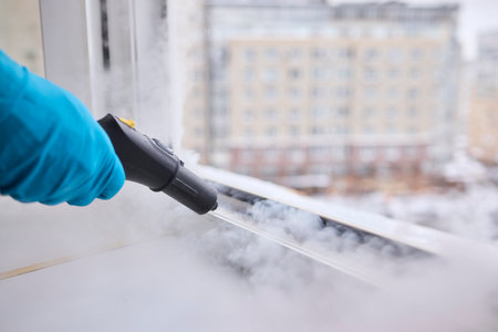 Efficient Steam Cleaning of Windows Utilizing Specialized Professional Equipment and Toolsの写真素材