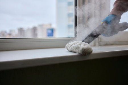 Using a Steam Roller to Clean Windows Effectively for a Beautiful and Sparkling Shineの写真素材