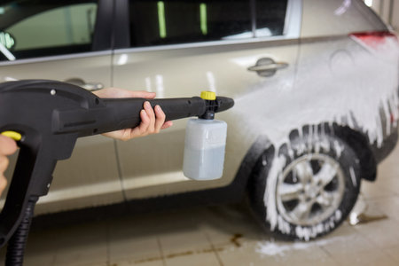The High Pressure Car Cleaning Tool is used for efficient car cleaning and maintenanceの写真素材