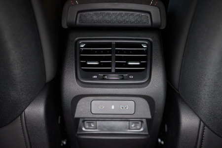 A close up of a car's rear air conditioning system