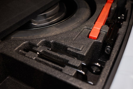 The Car Tool Kit and Accessories Storage Compartment is designed for convenience and organization