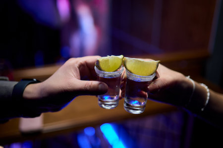 Cheers to Friendship Celebrating with Shots, Slices, and Great Vibes All Night Longの写真素材