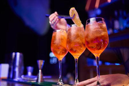 Experience Vibrant Cocktails at a Modern Bar Perfect Evening Delight Awaits You Hereの写真素材