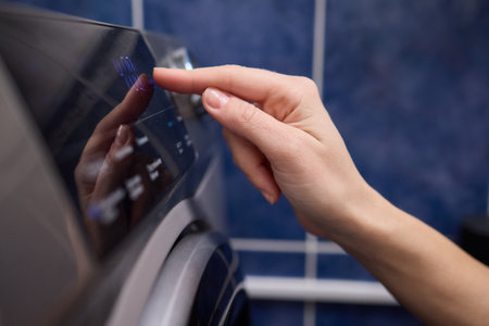 Operating a Modern Washing Machine A Comprehensive Guide to Efficient, User Friendly Useの写真素材