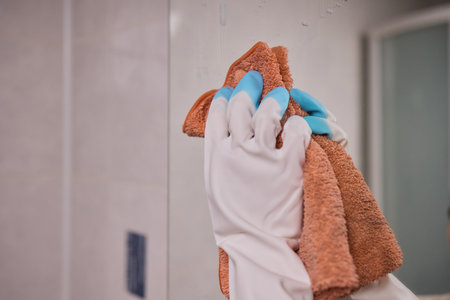 For cleaning a mirror effectively, using a microfiber cloth ensures the best resultsの写真素材