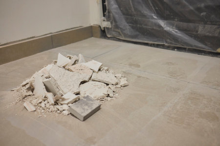 Construction debris is scattered across the floor after the recent renovation work