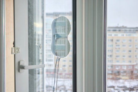 Introducing an Innovative Window Cleaning Gadget Designed Specifically for Urban Living Spacesの写真素材