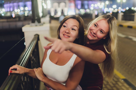 lgbt couple of girls hug and enjoy each other.の写真素材