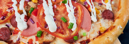 Homemade Hot Supreme PIzza with Pepperoni Peppers and Sausage.の写真素材