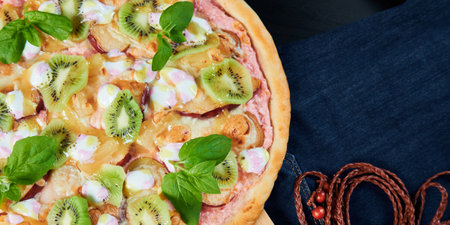 Pizza dessert sweet with kiwi and banana fruits.の写真素材