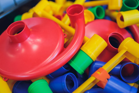 Multi-colored blocks of a constructor. Concept of development of preschool children. Close.
