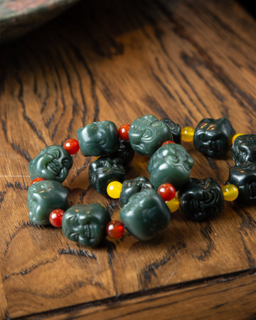 Colorful beads made of natural semiprecious stones on a white background. Isolated jewelry close up. Stone texture, energy mineral, beaded necklaces, rock.の写真素材