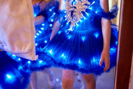An Illuminated Blue Tutu Dress Perfect for Stunning Performances and Spectacular Eventsの写真素材