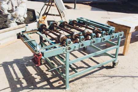 Industrial Equipment Featuring a Roller Mechanism Within an Urban Environment Context