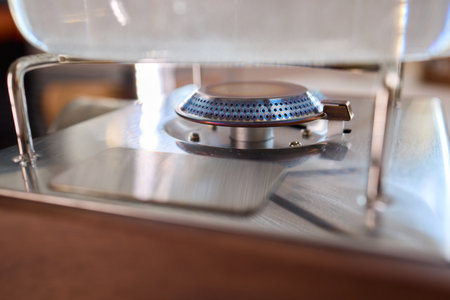 A closeup view showcasing a stylish gas stove adorned with unique and captivating flame patterns