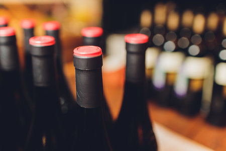 Closeup of full corked bottles of wine.の写真素材