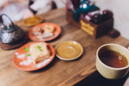 Georgian sweet food. black tea in a cup with oriental.の写真素材