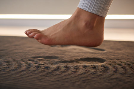 Footprint on Sand Capturing Natures Beautiful and Ephemeral Moments in Time and Spaceの写真素材