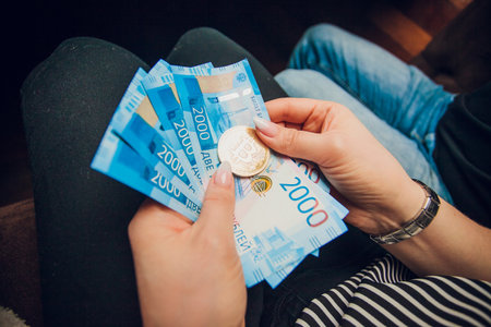 Business man holding bitcoin in his hand. Electronic money concept.の写真素材