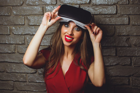 girl in red dress virtual glasses vr.の写真素材